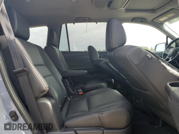 2022 Honda Pilot Touring 7-Passenger z VIN 5FNYF5H69NB031540, wystawiony jako Copart lot #51661185 z przebiegiem 58 316 mil mil oraz Szkoda całkowita • Salvage title. Historia ofert i sprzedaży dostępna na DreamBid. Obrazek 11.