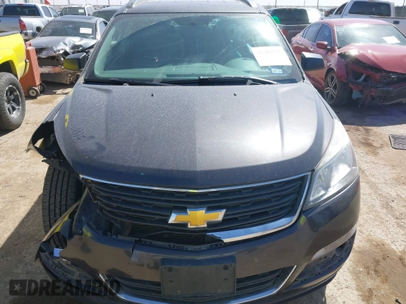 2015 Chevrolet Traverse LS z VIN 1GNKVFED7FJ203566, wystawiony jako IAAI lot #41783373 z przebiegiem 147 309 mil mil oraz . Historia ofert i sprzedaży dostępna na DreamBid. Obrazek 12.