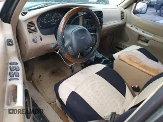 1999 Ford Explorer XL z VIN 1FMDU32E9XZB67958, wystawiony jako Copart lot #75350694 z przebiegiem 202 939 mil mil oraz Szkoda całkowita • Salvage title. Historia ofert i sprzedaży dostępna na DreamBid. Obrazek 8.