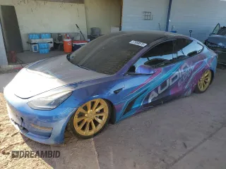 2021 Tesla Model 3 Standard Range Plus z VIN 5YJ3E1EA1MF990816, wystawiony jako Copart lot #57688875 z przebiegiem Nie podano mil oraz Szkoda całkowita • Salvage title. Historia ofert i sprzedaży dostępna na DreamBid. Obrazek 1.