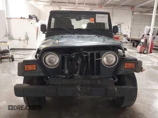 2003 Jeep Wrangler X z VIN 1J4FA39S43P339234, wystawiony jako IAAI lot #41329654 z przebiegiem 175 376 mil mil oraz . Historia ofert i sprzedaży dostępna na DreamBid. Obrazek 12.