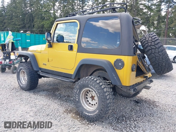 2003 Jeep Wrangler Rubicon with VIN 1J4FA69S93P302102, listed as a IAAI auction lot 42312951 with 146,408 mi miles and . Bid and sale history available at DreamBid. Image 3.