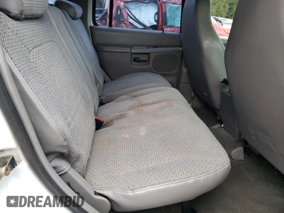2000 Ford Explorer XLS z VIN 1FMZU72X5YZC21823, wystawiony jako Copart lot #45025955 z przebiegiem 185 511 mil mil oraz Szkoda całkowita • Salvage title. Historia ofert i sprzedaży dostępna na DreamBid. Obrazek 11.