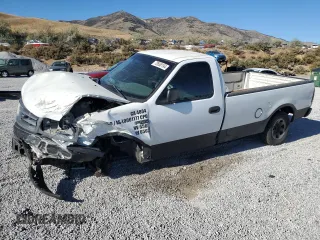 2000 Ford F-150 XL with VIN 2FTPF17Z5YCA99717, listed as a Copart auction lot 70658194 with Not provided miles and Salvage title. Bid and sale history available at DreamBid. Image 1.