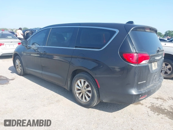 2017 Chrysler Pacifica Touring with VIN 2C4RC1DG6HR509717, listed as a IAAI auction lot 42228096 with 86,956 mi miles and . Bid and sale history available at DreamBid. Image 3.