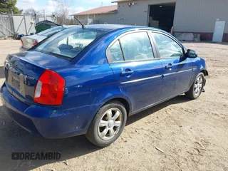 2006 Hyundai Accent GLS with VIN KMHCN46C86U055221, listed as a IAAI auction lot 42028714 with 1 mi miles. Bid and sale history available at carsss.com. Image 4.