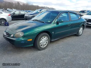 1999 Ford Taurus SE with VIN 1FAFP53S5XA102534, listed as a IAAI auction lot 41740212 with 154,926 mi miles. Bid and sale history available at carsss.com. Image 2.