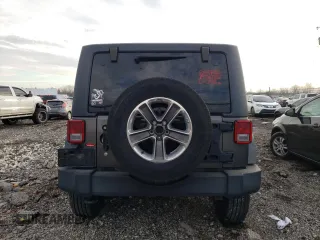 2018 Jeep Wrangler JK Unlimited Sport S with VIN 1C4BJWDG9JL882737, listed as a Copart auction lot 85765184 with 60,578 mi miles and Salvage Title. Bid and sale history available at carsss.com. Image 6.