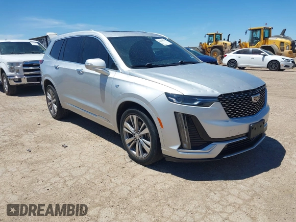 2020 Cadillac XT6 FWD Premium Luxury with VIN 1GYKPCRS7LZ104392, listed as a IAAI auction lot 42278675 with 81,001 mi miles and . Bid and sale history available at DreamBid. Image 1.