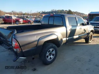 2015 Toyota Tacoma with VIN 3TMMU4FN5FM077680, listed as a IAAI auction lot 41008355 with 221,940 mi miles. Bid and sale history available at carsss.com. Image 4.