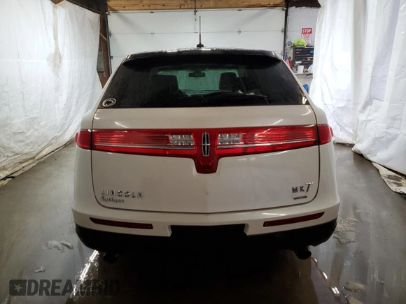 2016 Lincoln MKT EcoBoost z VIN 2LMHJ5AT8GBL01646, wystawiony jako Copart lot #85357264 z przebiegiem 77 066 mil mil oraz Szkoda całkowita • Salvage title. Historia ofert i sprzedaży dostępna na DreamBid. Obrazek 6.