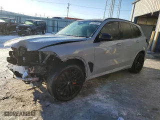 2025 BMW X5 M60i with VIN 5UX33EU06S9W26581, listed as a Copart auction lot 88101595 with 5,824 mi miles and Salvage Title. Bid and sale history available at carsss.com. Image 1.