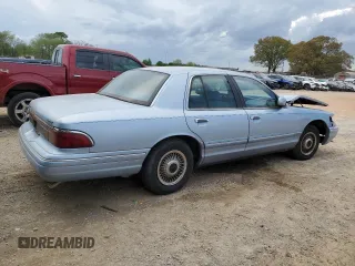 1997 Mercury Grand Marquis GS z VIN 2MELM74W2VX642879, wystawiony jako Copart lot #51464035 z przebiegiem 117 860 mil mil oraz Szkoda całkowita • Salvage title. Historia ofert i sprzedaży dostępna na DreamBid. Obrazek 3.