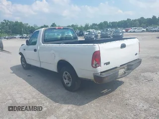 2004 Ford F-150 XL with VIN 2FTRF17204CA52584, listed as a IAAI auction lot 42545265 with 142,072 mi miles and . Bid and sale history available at DreamBid. Image 3.