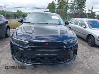 2024 Dodge Hornet R/T z VIN ZACPDFCW9R3A32594, wystawiony jako IAAI lot #42312913 z przebiegiem 22 544 mil mil oraz . Historia ofert i sprzedaży dostępna na DreamBid. Obrazek 12.