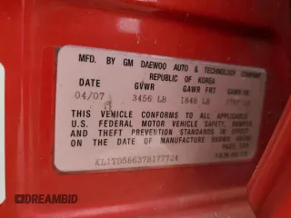 2007 Chevrolet Aveo LS z VIN KL1TD56637B177724, wystawiony jako Copart lot #87205464 z przebiegiem 164 192 mil mil oraz Szkoda całkowita • Salvage title. Historia ofert i sprzedaży dostępna na DreamBid. Obrazek 12.