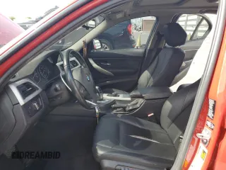 2013 BMW 3 Series 328i xDrive with VIN WBA3B3C5XDJ810958, listed as a Copart auction lot 60620005 with 143,589 mi miles and Salvage title. Bid and sale history available at DreamBid. Image 7.