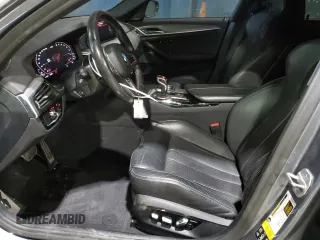2020 BMW M5 Competition z VIN WBSJF0C04LCD78223, wystawiony jako Copart lot #50374745 z przebiegiem 41 985 mil mil oraz Czysty tytuł • Clean title. Historia ofert i sprzedaży dostępna na DreamBid. Obrazek 7.