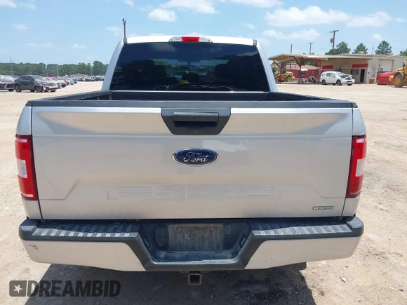 2019 Ford F-150 XL with VIN 1FTEW1EP5KKD24620, listed as a IAAI auction lot 42631896 with 123,583 mi miles and . Bid and sale history available at DreamBid. Image 16.