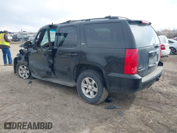 2011 GMC Yukon SLT with VIN 1GKS2CE02BR365229, listed as a IAAI auction lot 41601082 with 203,739 mi miles. Bid and sale history available at carsss.com. Image 3.