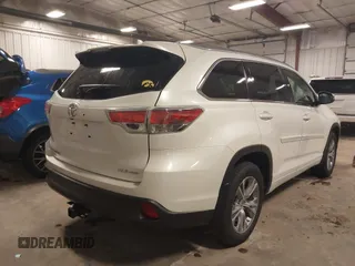 2015 Toyota Highlander XLE z VIN 5TDJKRFH9FS115122, wystawiony jako IAAI lot #41925336 z przebiegiem 159 518 mil mil oraz . Historia ofert i sprzedaży dostępna na DreamBid. Obrazek 4.