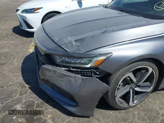 2020 Honda Accord Sport z VIN 1HGCV2F32LA020830, wystawiony jako IAAI lot #42048772 z przebiegiem 84 294 mil mil oraz . Historia ofert i sprzedaży dostępna na DreamBid. Obrazek 6.