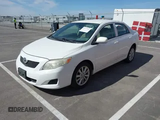 2009 Toyota Corolla with VIN JTDBL40E29J001368, listed as a IAAI auction lot 41777597 with 289,079 mi miles. Bid and sale history available at carsss.com. Image 2.
