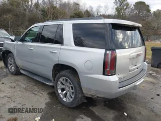 2016 GMC Yukon SLE with VIN 1GKS2AKC0GR332224, listed as a IAAI auction lot 41301706 with 108,340 mi miles. Bid and sale history available at carsss.com. Image 3.