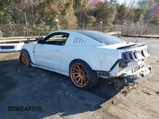 2013 Ford Mustang GT with VIN 1ZVBP8CF1D5208753, listed as a IAAI auction lot 41754011 with 158,809 mi miles and . Bid and sale history available at DreamBid. Image 3.