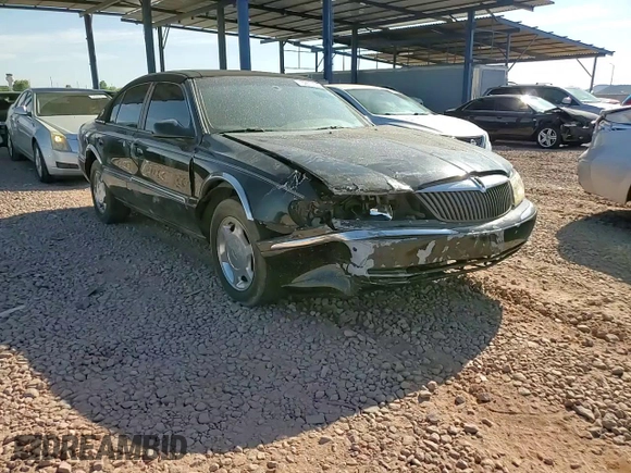 2001 Lincoln Continental with VIN 1LNHM97V61Y604213, listed as a Copart auction lot 52517535 with 112,391 mi miles and Salvage Title. Bid and sale history available at DreamBid. Image 11.