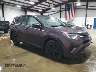 2018 Toyota RAV4 LE with VIN 2T3BFREV5JW721315, listed as a Copart auction lot 59016665 with 136,490 mi miles and Salvage title. Bid and sale history available at DreamBid. Image 4.