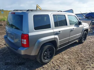 2014 Jeep Patriot Latitude with VIN 1C4NJPFB3ED905756, listed as a IAAI auction lot 42317351 with 137,874 mi miles and . Bid and sale history available at DreamBid. Image 4.