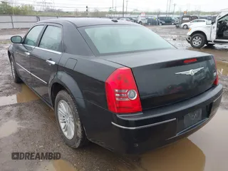 2010 Chrysler 300 Touring with VIN 2C3CA5CV5AH144949, listed as a IAAI auction lot 41955931 with 236,658 mi miles. Bid and sale history available at carsss.com. Image 3.