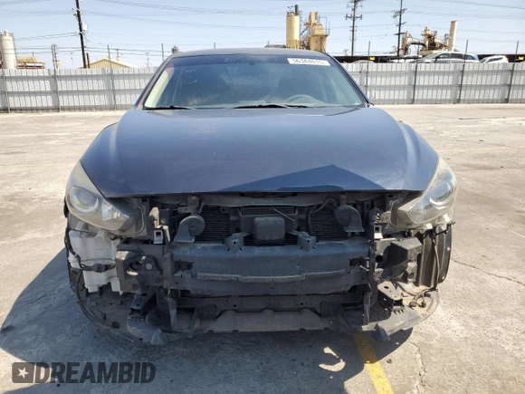 2017 Mazda 3 Sport with VIN 3MZBN1U7XHM104377, listed as a Copart auction lot 56344615 with 139,084 mi miles and Salvage Title. Bid and sale history available at DreamBid. Image 5.