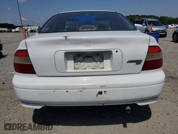 1994 Honda Accord с VIN 1HGCD5642RA166652, выставлен на аукционе Copart как лот 57225365 с пробегом 247 643 миль миль и Списание • Salvage title. История ставок и продаж доступна на DreamBid. Изображение 6.