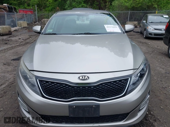 2014 Kia Optima EX z VIN 5XXGN4A70EG335090, wystawiony jako IAAI lot #42272655 z przebiegiem 165 795 mil mil oraz . Historia ofert i sprzedaży dostępna na DreamBid. Obrazek 6.