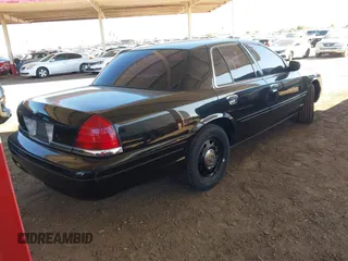 2007 Ford Police Interceptor with VIN 2FAFP71W27X115458, listed as a IAAI auction lot 42566334 with 213,435 mi miles and . Bid and sale history available at DreamBid. Image 4.