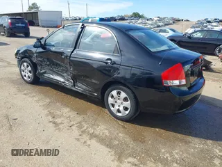 2008 Kia Spectra EX with VIN KNAFE121085549166, listed as a IAAI auction lot 41890354 with 214,401 mi miles. Bid and sale history available at carsss.com. Image 3.