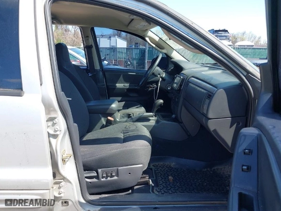 2004 Jeep Grand Cherokee Laredo with VIN 1J4GW48N74C372583, listed as a IAAI auction lot 41915693 with 154,273 mi miles. Bid and sale history available at carsss.com. Image 5.