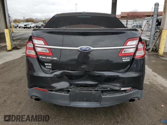 2015 Ford Taurus SEL with VIN 1FAHP2E94FG137935, listed as a Copart auction lot 80921824 with 172,324 mi miles and Salvage Title. Bid and sale history available at DreamBid. Image 6.