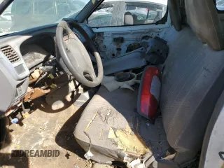 1998 Nissan Frontier XE with VIN 1N6DD21S9WC357098, listed as a Copart auction lot 77652604 with Not provided miles and Clean title. Bid and sale history available at DreamBid. Image 7.