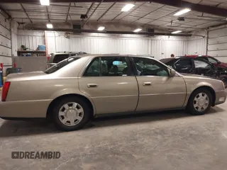 2004 Cadillac DeVille z VIN 1G6KD54Y04U119341, wystawiony jako IAAI lot #42193664 z przebiegiem 162 290 mil mil oraz . Historia ofert i sprzedaży dostępna na DreamBid. Obrazek 14.