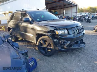2015 Jeep Grand Cherokee Altitude with VIN 1C4RJFAG6FC796571, listed as a IAAI auction lot 41258471 with 104,049 mi miles. Bid and sale history available at carsss.com. Image 1.