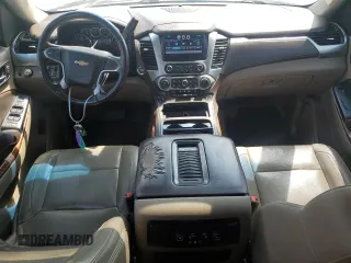 2015 Chevrolet Tahoe LTZ with VIN 1GNSCCKC2FR693500, listed as a Copart auction lot 60225195 with 206,210 mi miles and Salvage title. Bid and sale history available at DreamBid. Image 8.
