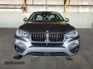 2015 BMW X6 xDrive35i with VIN 5UXKU2C59F0N77312, listed as a Copart auction lot 63591123 with 121,105 mi miles. Bid and sale history available at carsss.com. Image 5.