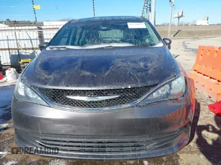 2017 Chrysler Pacifica Touring with VIN 2C4RC1DG7HR648786, listed as a IAAI auction lot 41570029 with 125,406 mi miles and . Bid and sale history available at DreamBid. Image 13.