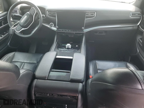 2023 Jeep Grand Wagoneer with VIN 1C4SJUAT0PS543448, listed as a Copart auction lot 55463895 with 34,664 mi miles and Salvage title. Bid and sale history available at DreamBid. Image 8.