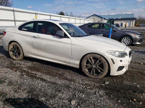 2015 BMW 2 Series M235i xDrive with VIN WBA1J9C58FV371512, listed as a Copart auction lot 73705142 with 111,248 mi miles and . Bid and sale history available at carsss.com. Image 4.