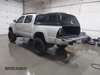 2011 Toyota Tacoma with VIN 3TMLU4EN9BM070836, listed as a IAAI auction lot 41668595 with 89,879 mi miles and . Bid and sale history available at DreamBid. Image 3.