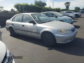 1999 Honda Civic LX z VIN 2HGEJ6675XH562090, wystawiony jako Copart lot #54111445 z przebiegiem 202 417 mil mil oraz Czysty tytuł • Clean title. Historia ofert i sprzedaży dostępna na DreamBid. Obrazek 4.